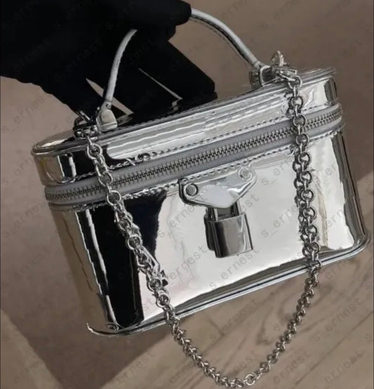 Silver lock and key purse
